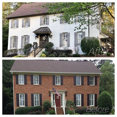 painted brick house with brown metal roof|brick house with brown roof.